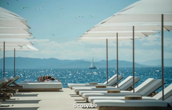 TUUCI Parasols droits à mât central en aluminium.